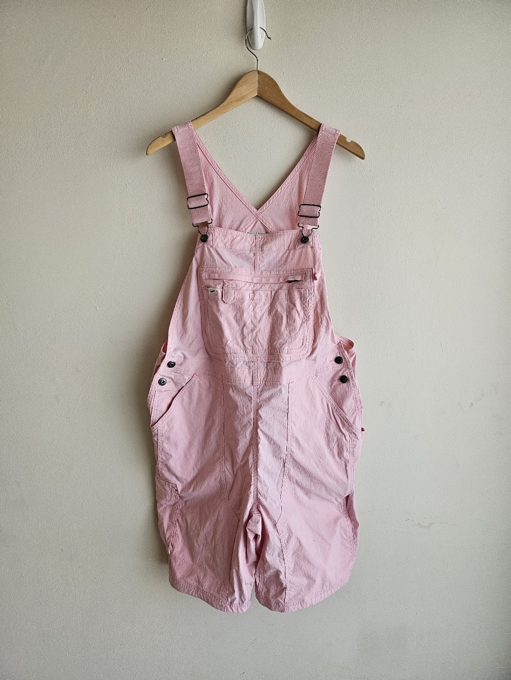 Duluth Trading Company Heirloom Gardening Short Overalls in a light pink color.